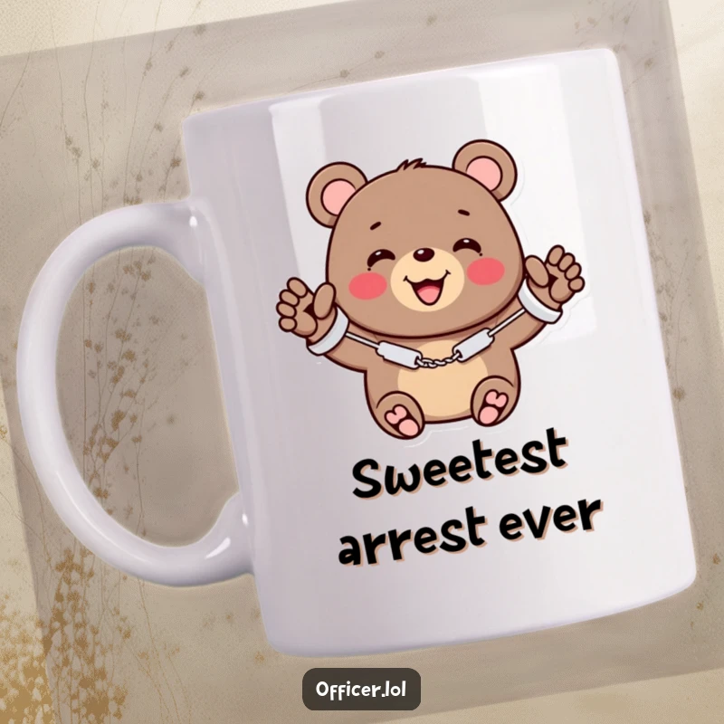 Funny mug of a cheerful bear wearing tiny handcuffs and a big smile, giving a friendly wave.