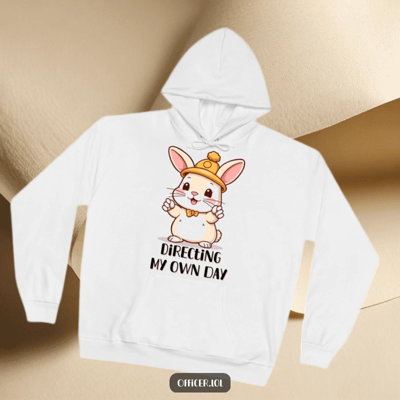 Funny hoodie featuring a playful rabbit wearing a hat, enthusiastically directing traffic with paws raised high.