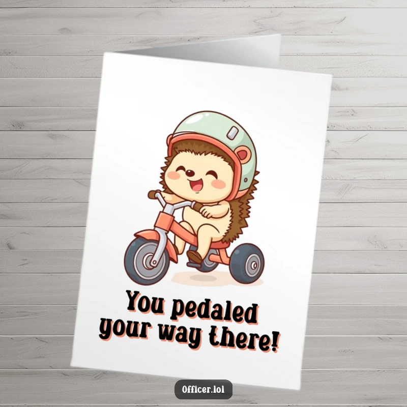 Funny Free Printable Congratulations Card: Giggling hedgehog on a tricycle, celebrating victory with pure joy.