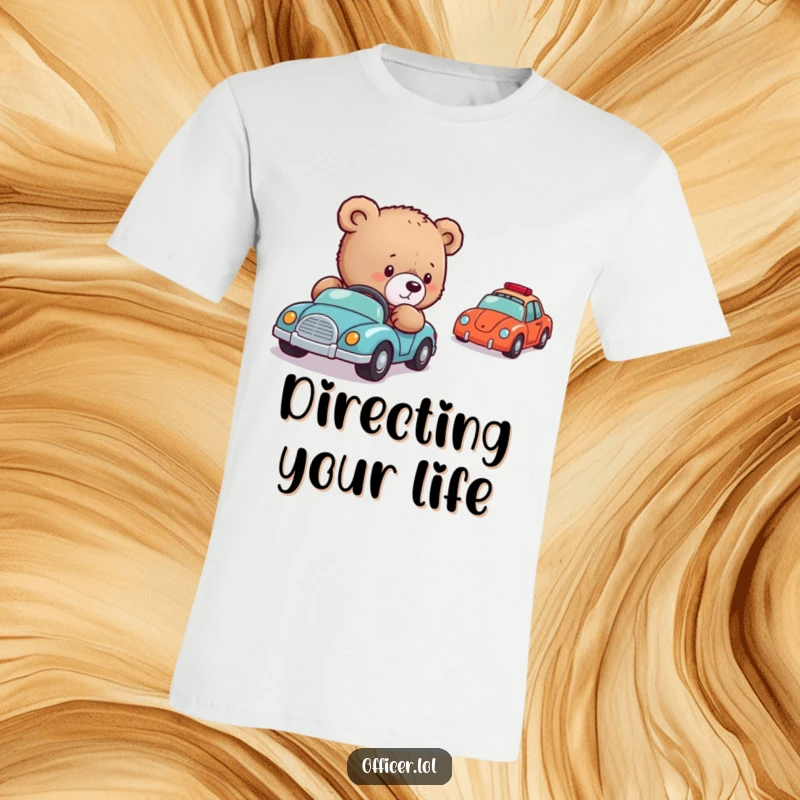 Funny Bear Cub Car Director T-Shirt: A bear cub stands proudly, directing a line of tiny toy cars with a serious yet adorable demeanor.